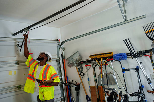 Professional Garage Door Panel Replacement technician working in Scottsboro, AL